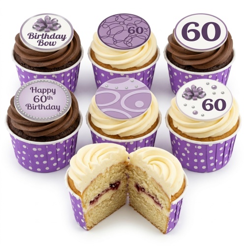 Assortment of purple and white birthday cupcakes with bow and custom age toppers, some chocolate and vanilla.