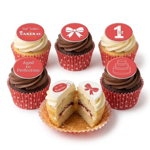 Set of red and white celebration cupcakes with custom age and bow toppers