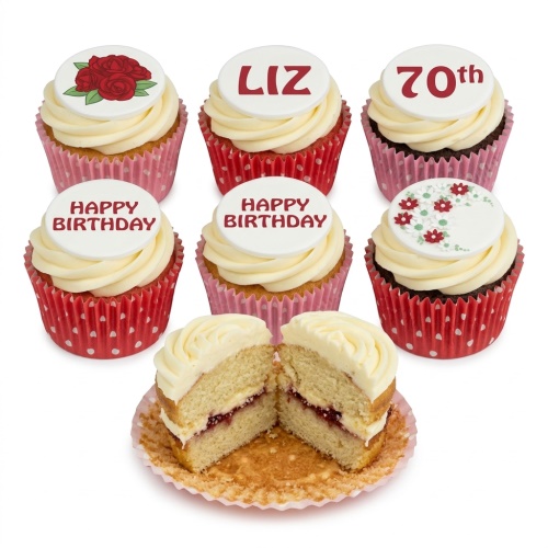 A selection of birthday cupcakes with floral designs, custom name, and custom age toppers.