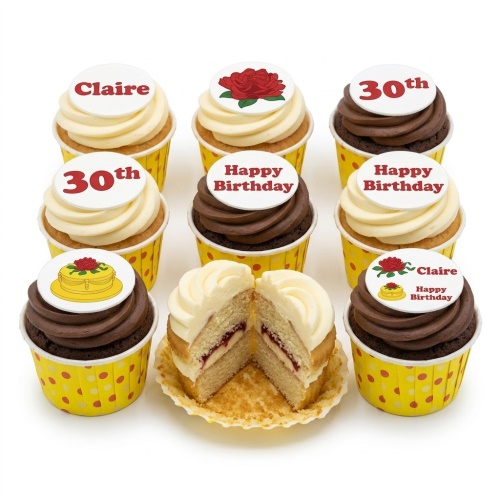 Assortment of floral birthday cupcakes with rose and cake toppers, vanilla and chocolate frosting.