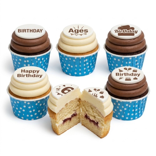 Assorted birthday cupcakes with vanilla and chocolate frosting, blue polka dot cases, and custom age toppers.