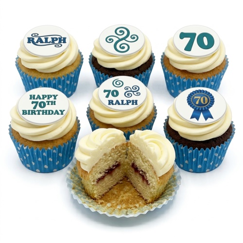 Custom age birthday cupcakes with white frosting, blue cases, and Celtic swirl toppers.