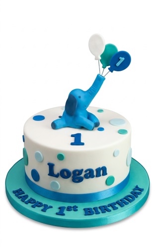 White round cake with a blue elephant, blue and white balloons, and blue polka dots, on a blue cake board.