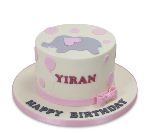 Cute elephant birthday cake for girls with pink balloons and personalised name.