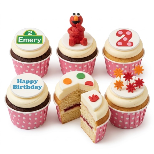 Elmo themed birthday cupcakes with various toppers, including a character figurine, custom age number, and a personalised message.