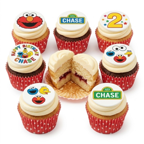 Sesame Street themed cupcakes with Elmo, Cookie Monster, Big Bird, and custom age/name toppers.