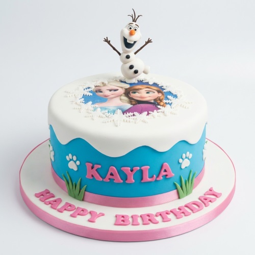 Round Frozen themed birthday cake with Olaf topper, edible image of Elsa and Anna, and custom name.