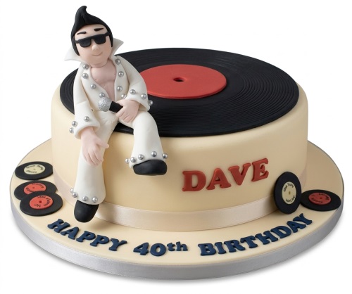 Elvis Presley figurine on a vinyl record birthday cake with custom name and age.