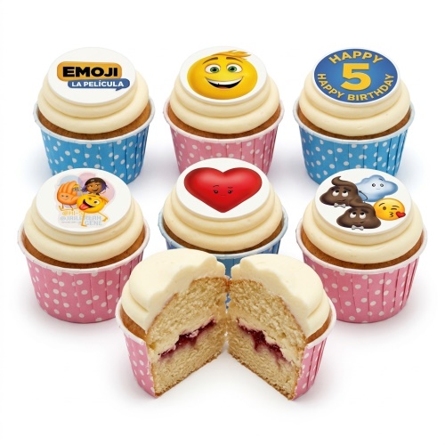 Emoji themed birthday cupcakes with white frosting, colourful polka dot cases, and custom age topper example.