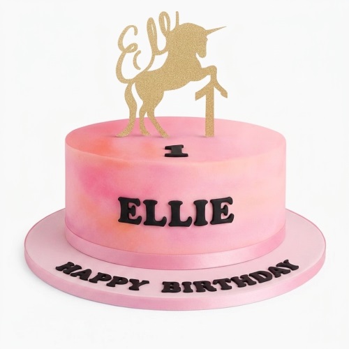 Pink ombre unicorn birthday cake with gold glitter unicorn and custom age topper, and a personalised message.
