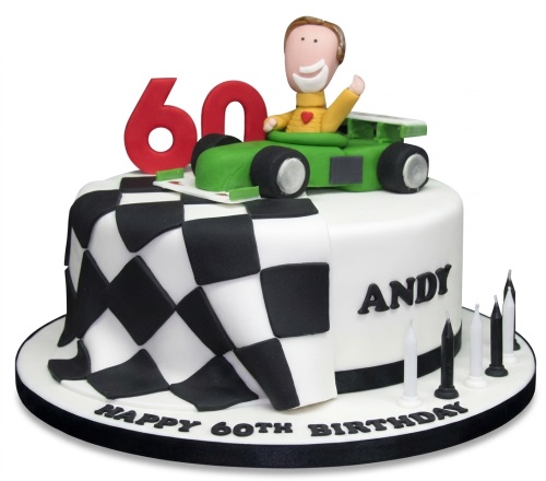 White racing car themed birthday cake with checkered flag design and custom age topper.