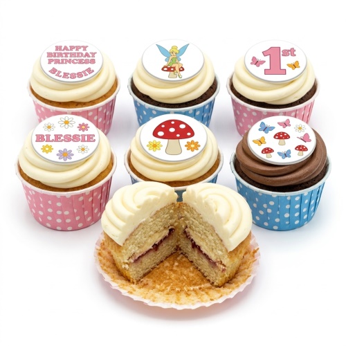 Vanilla and chocolate cupcakes with Tinkerbell, mushroom, butterfly, and 'Happy Birthday Princess' toppers.