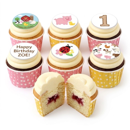 Cupcakes with farm animal and ladybug toppers, some with 'Happy Birthday' message and a number '1'.
