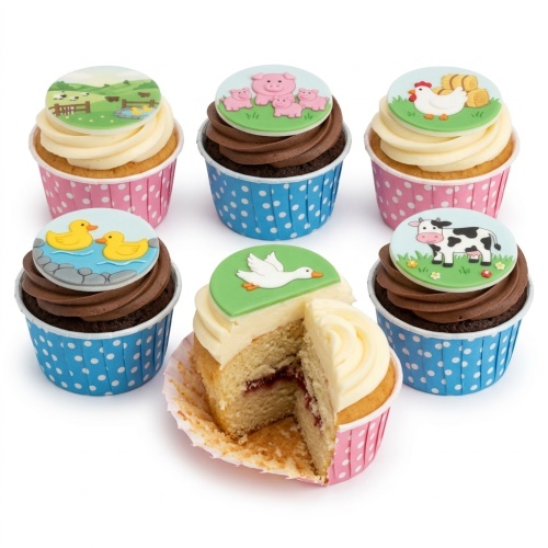 Six farm animal themed cupcakes with vanilla and chocolate frosting, featuring edible toppers of pigs, chickens, ducks, a cow, a goose, and sheep.