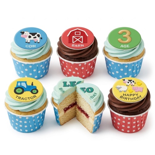 Farm animal themed cupcakes with cow, barn, tractor, sheep, pig, and duck toppers. Features a custom age topper.