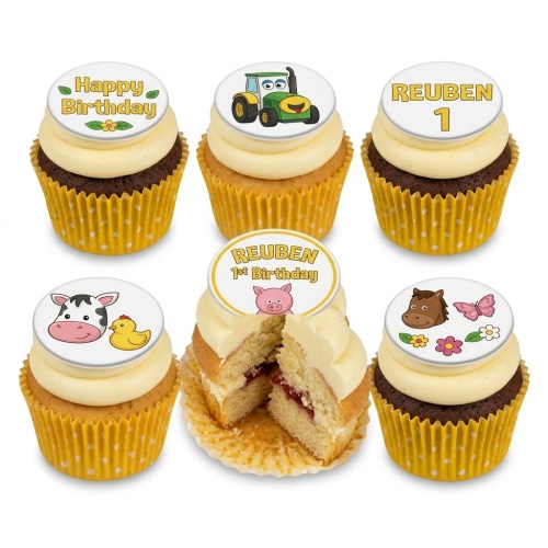 A selection of farm animal themed cupcakes with a tractor, cow, pig, horse, and 'Happy Birthday' message toppers.