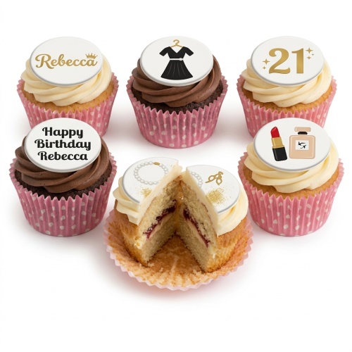 Set of cupcakes with fashion and beauty themed toppers, including a black dress, pearls, lipstick, perfume, and a custom age topper.