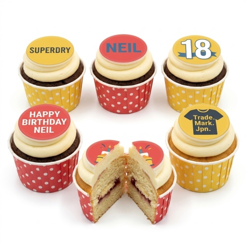Assortment of birthday cupcakes with customisable red and yellow disc toppers and white frosting.
