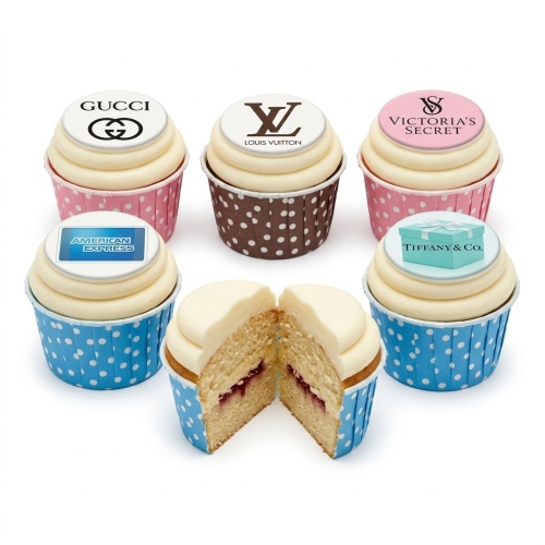 Cupcakes with designer brand logos including Gucci, Louis Vuitton, Tiffany & Co., Victoria's Secret, and American Express.
