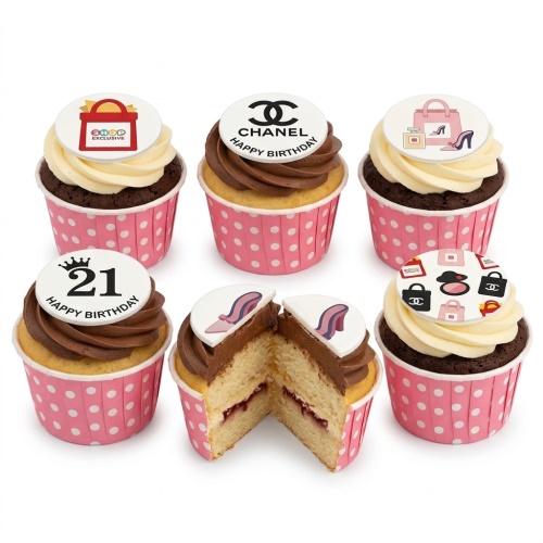 Chanel theme birthday cupcakes with fashion accessories, shopping bags, and a custom age topper in pink polka dot cases.