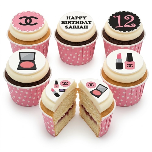 Cupcakes with pink polka dot wrappers, cream frosting, and edible discs featuring designer-inspired logos, makeup items, and custom age and name examples.