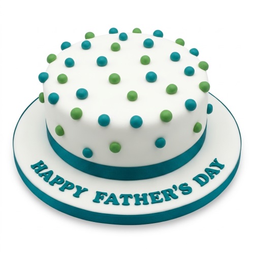 Round white cake with teal and lime green polka dots, a teal ribbon, and "Happy Father's Day" written on the board.
