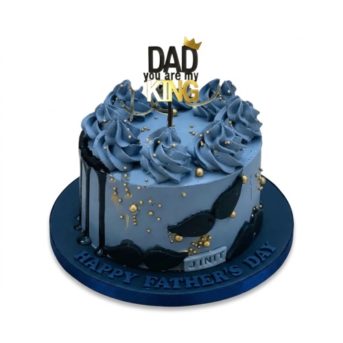 Blue Father's Day cake with "DAD you are my KING" topper, gold sprinkles, black drip, and mustache decorations.