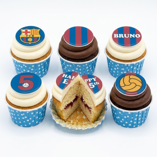 FC Barcelona themed cupcakes with red and blue stripes, footballs, and custom age and name toppers.