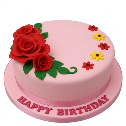 Round pink birthday cake decorated with red roses, green leaves, and small red and yellow flowers. "Happy Birthday" written on the board.