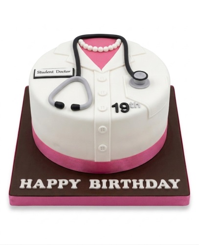 Round white lab coat birthday cake with pink accents, stethoscope, and custom age.
