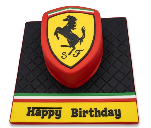Red Ferrari shield logo birthday cake on a black quilted board with Italian flag stripes and 'Happy Birthday' message.