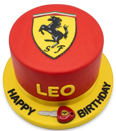 Round red and yellow Ferrari theme birthday cake with prancing horse logo and custom name.