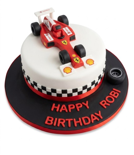 Round white birthday cake with a red Ferrari F1 racing car topper and black and white checkered band.