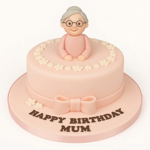 Pink birthday cake with fondant lady topper, white flowers, and a pink bow.
