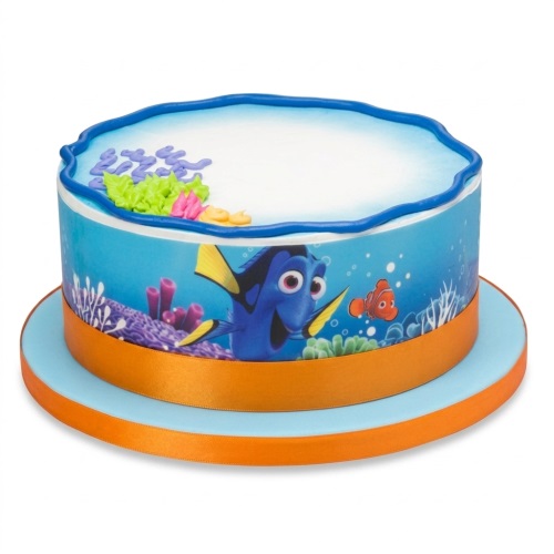 Round single-tier cake with Finding Dory and Nemo edible image wrap, blue icing, and orange ribbon.
