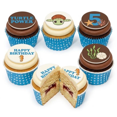 Assortment of Under The Sea themed cupcakes with turtle, seahorse, starfish, and custom age topper.