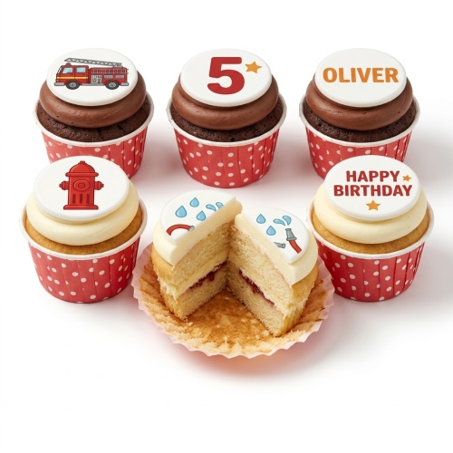 Fire engine themed birthday cupcakes with custom age, name, and 'Happy Birthday' toppers.