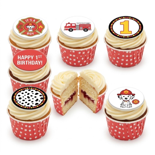Cupcakes with firefighter dalmatian, fire truck, and '1st Birthday' toppers on red polka dot wrappers.