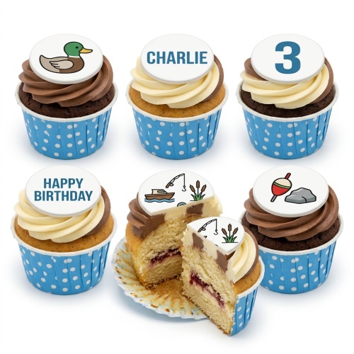 Six cupcakes with blue polka dot wrappers, topped with chocolate and cream frosting, featuring edible fishing and duck themed toppers.