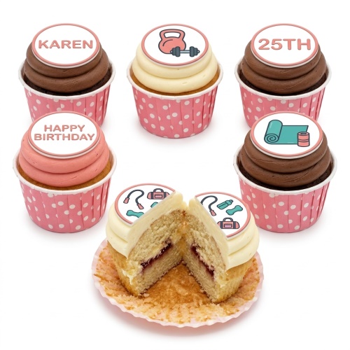 Selection of fitness theme birthday cupcakes with gym equipment toppers and pink wrappers.