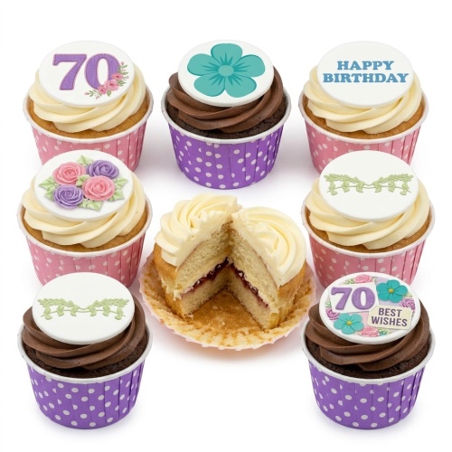 Assortment of floral birthday cupcakes with buttercream, edible flowers, and custom age toppers.