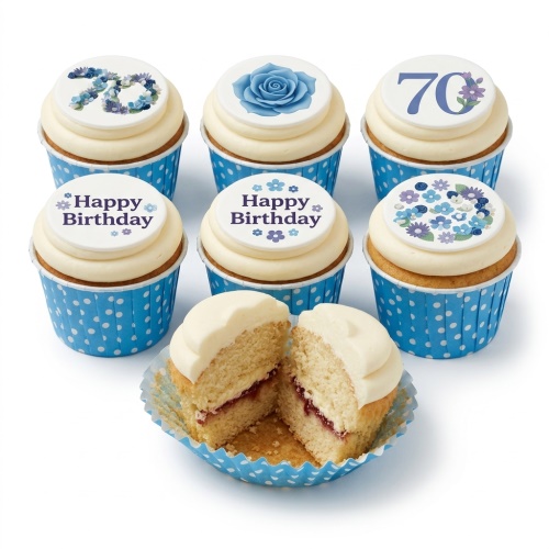 Six floral birthday cupcakes with blue and purple flower designs and custom age toppers in blue polka dot cases.