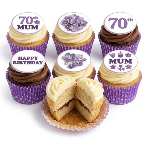 Six cupcakes with purple floral toppers and cream/chocolate frosting, one cut open to show jam filling.