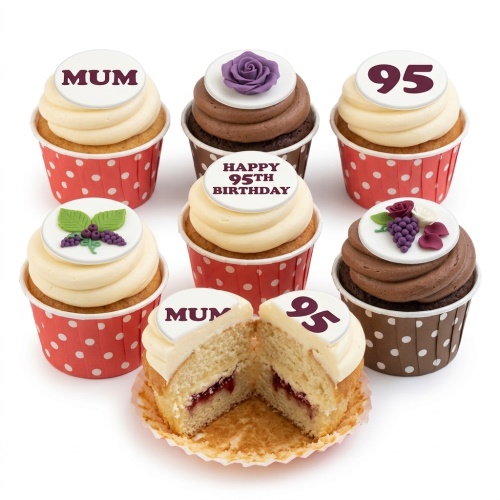 Assortment of floral and berry decorated birthday cupcakes with custom age and message toppers.