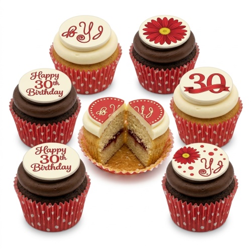 Assortment of elegant birthday cupcakes with floral designs, custom age 30 toppers, and personalised YJ initials, in red polka dot wrappers.