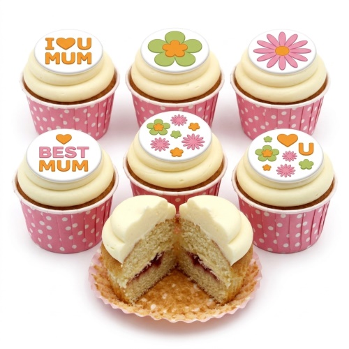 Six floral cupcakes with white frosting and pink polka dot wrappers. Some toppers have 'I ❤️ U MUM' and 'BEST MUM' messages.