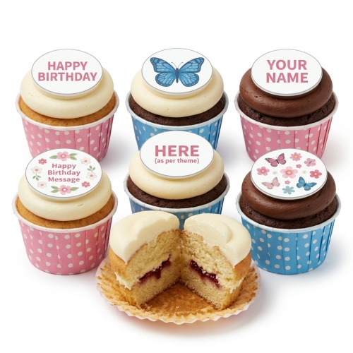 Assorted butterfly and floral birthday cupcakes with custom message toppers, pink and blue wrappers.