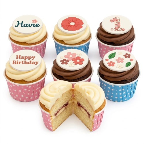 Assorted cupcakes with vanilla and chocolate frosting, topped with edible floral designs and customisable message discs.