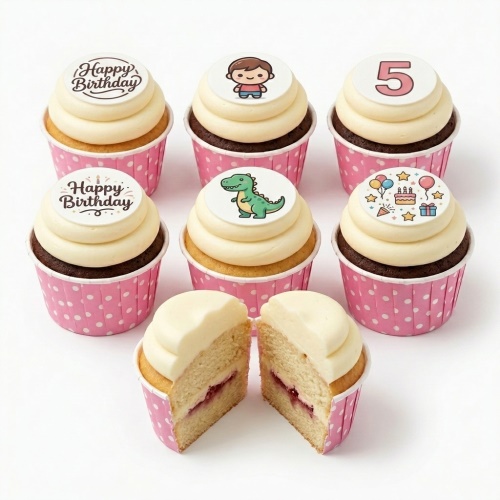 Assorted kids birthday cupcakes with dinosaur, boy, party, and custom age toppers