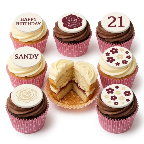 Assortment of birthday cupcakes with floral designs, custom age topper, and personalised name.